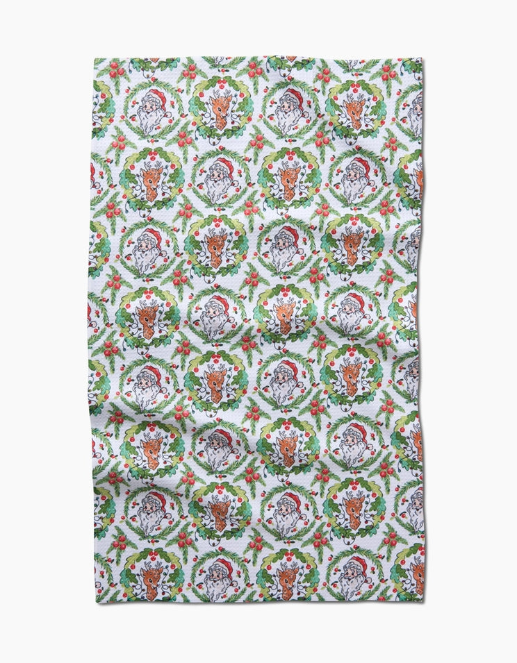 White waffle weave kitchen tea towel with a single-sided holiday print.
