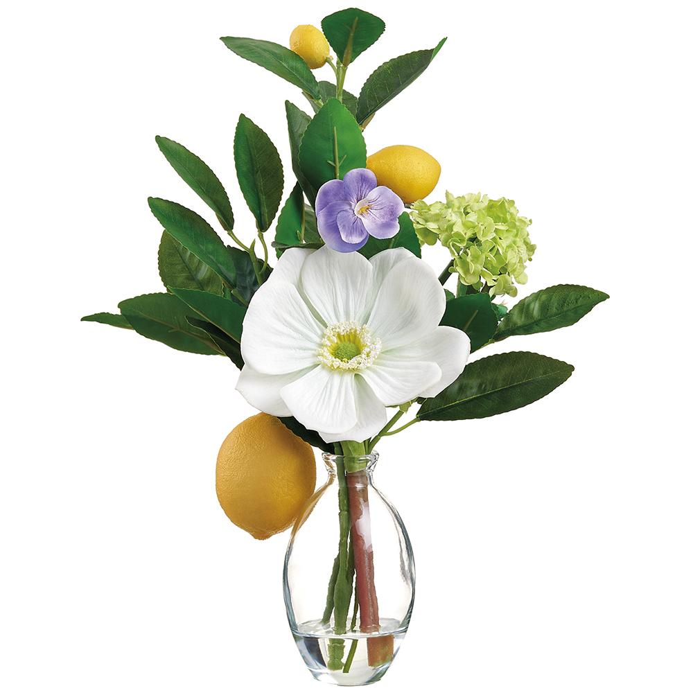 Glass vase with white anemone/snowball/lemon flowers in yellow tones