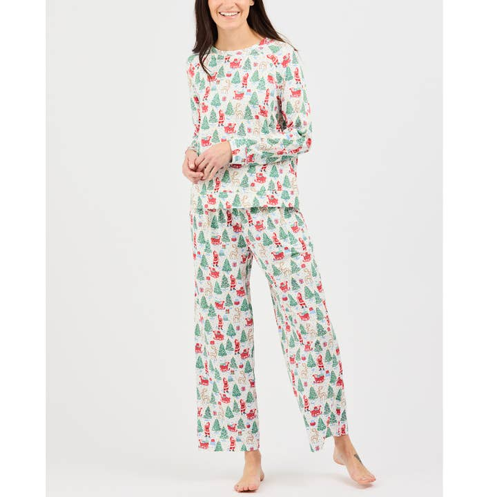 Woman wearing Pajamas Annie Long Sleeve Long Pants in a white Christmas tree and Santa print.
