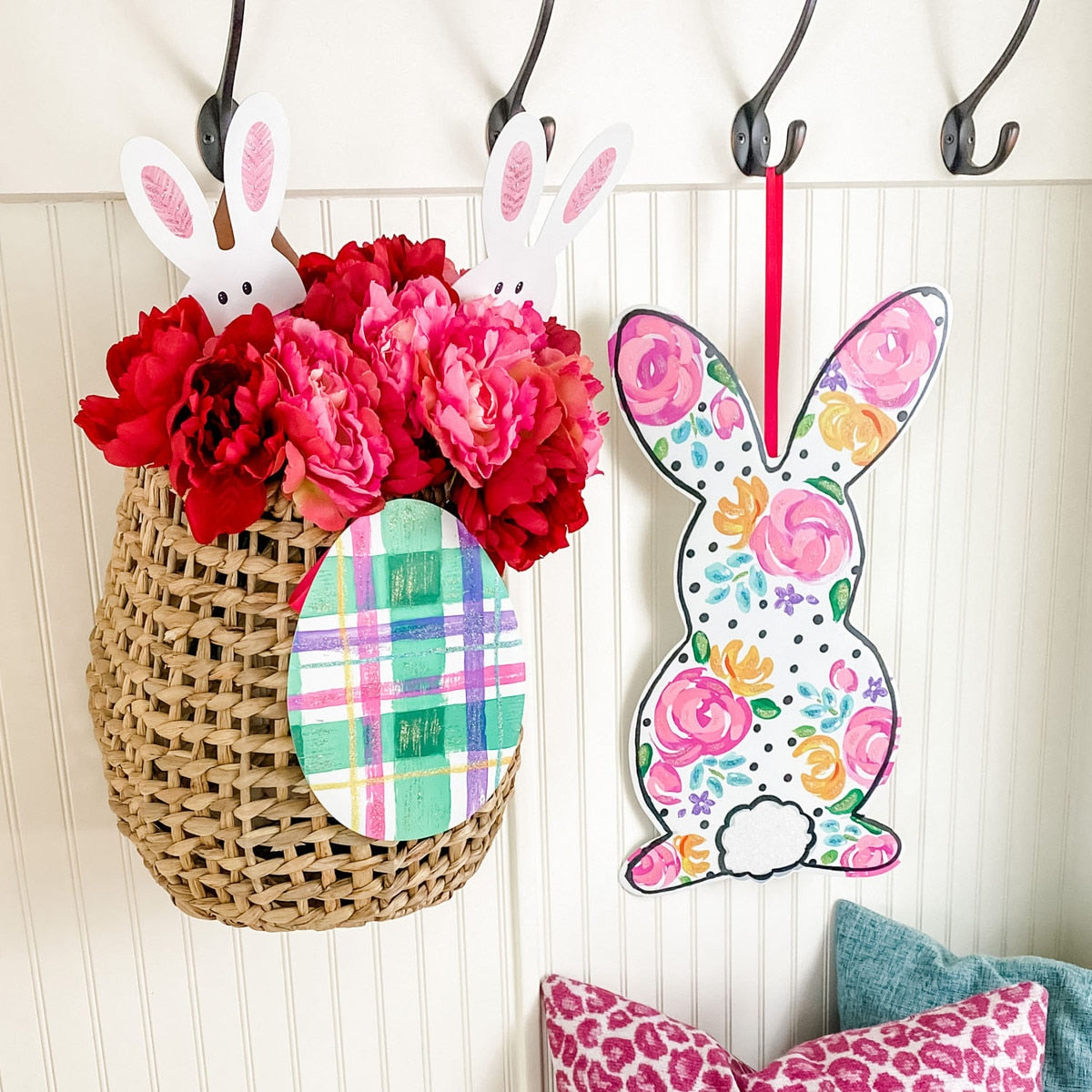 Artful Bunny door hanger featuring a white bunny silhouette with black outlines on a natural wood background.