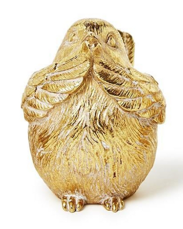 Three gold resin bird figurines in See No Evil poses displayed on a surface.