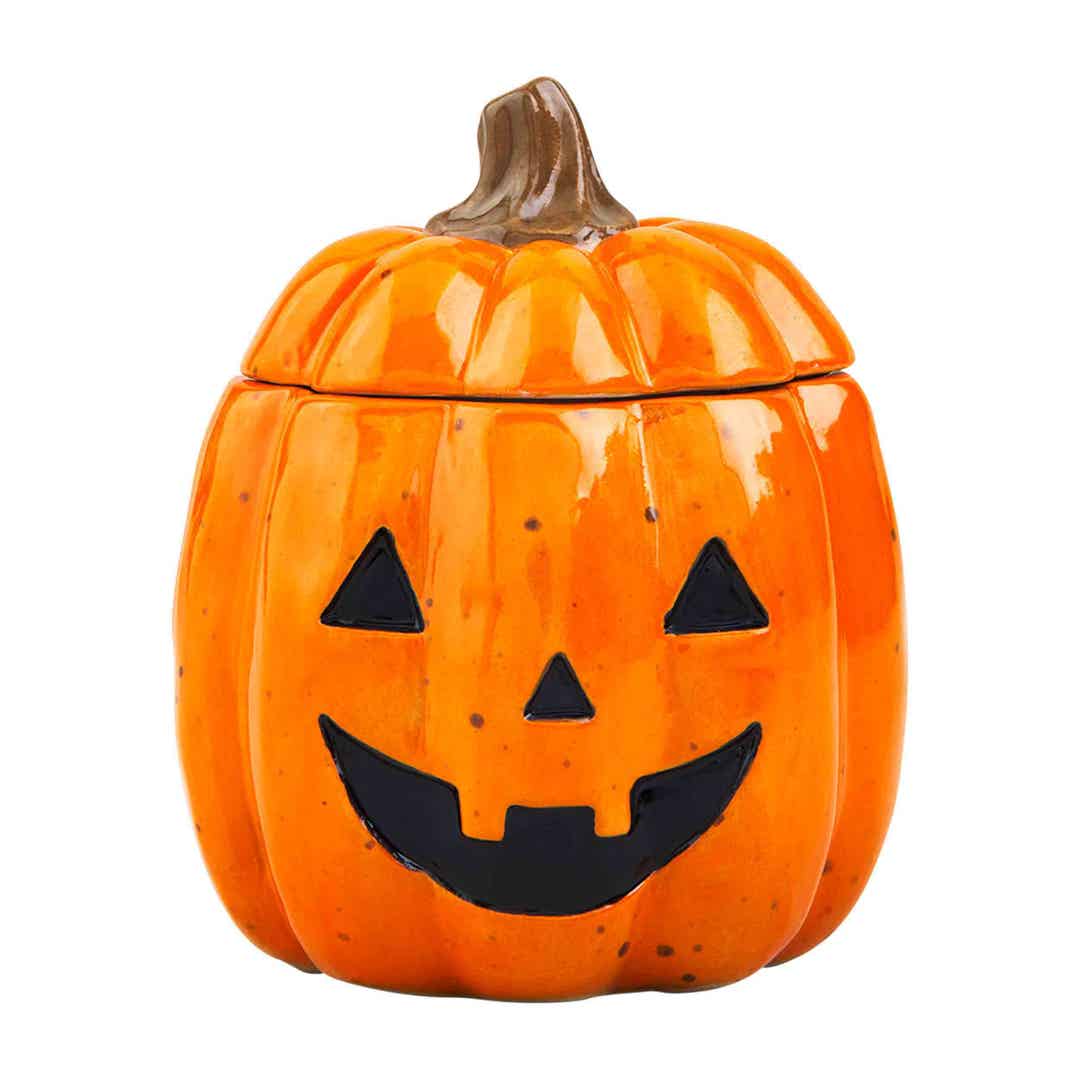 Stoneware Halloween candy canister in orange with black jack-o'-lantern silhouette and white text.
