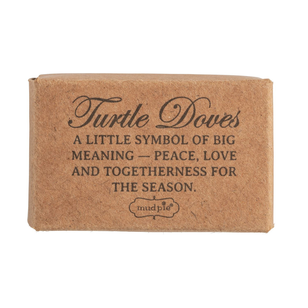 Brown kraft paper box for Pocket Turtledoves with sentimental holiday text and Mud Pie logo.