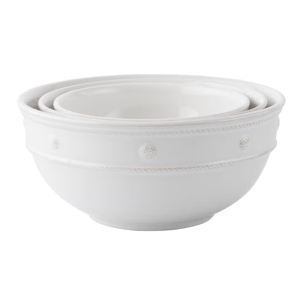 Whitewash ceramic nesting serving bowl with a natural berry pattern.