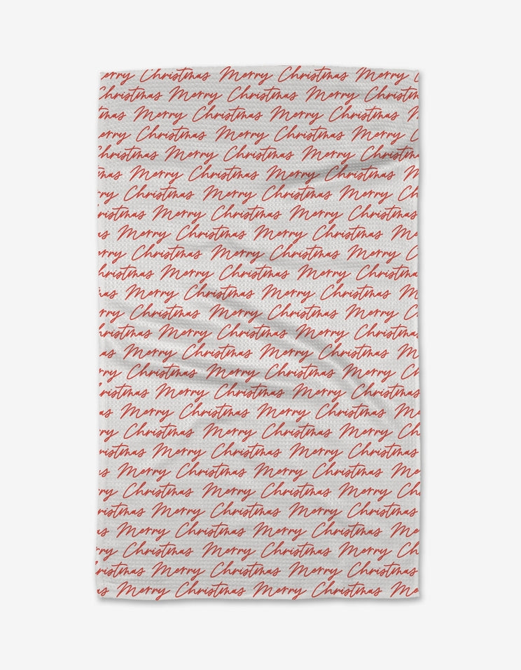 Waffle weave kitchen tea towel with holiday print in red.