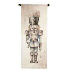 Vertical canvas scroll nutcracker with natural raw fabric texture.