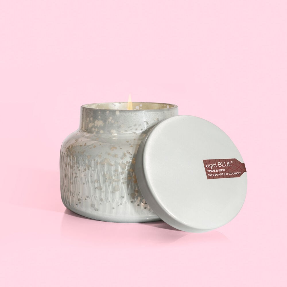 Holiday Mercury tinsel jar candle with spice scent in a silver metallic glass container