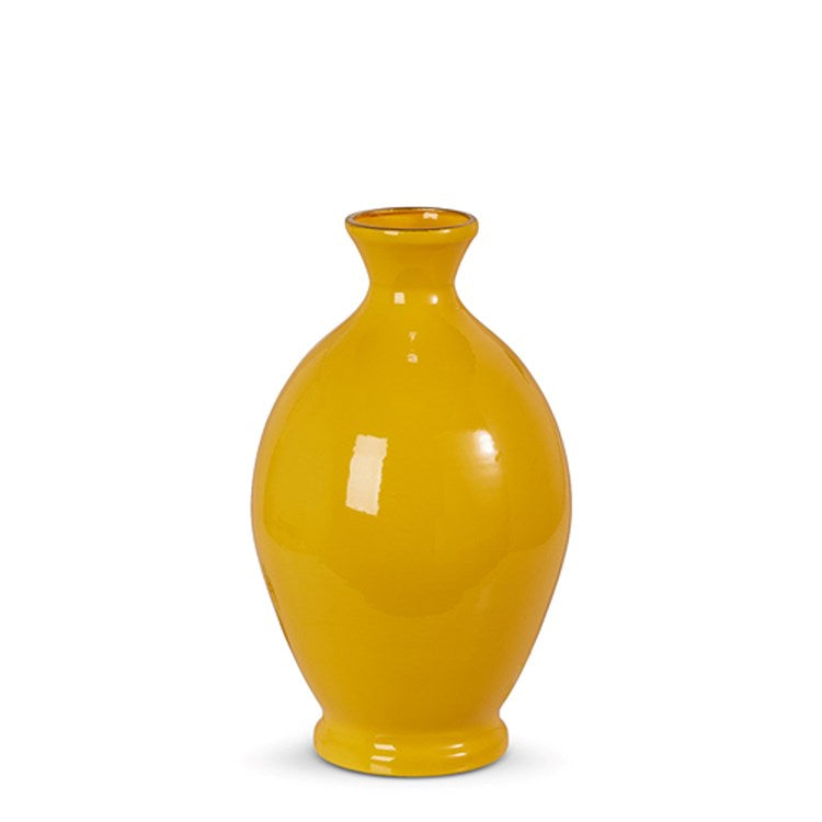 A yellow iron vase with a cylindrical shape measuring six inches wide by ten inches tall.