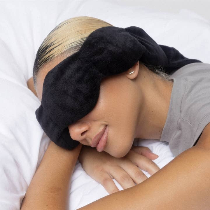 Cotton eye mask with a rectangular shape, measuring 29 inches by 4 inches and weighing 9 ounces.