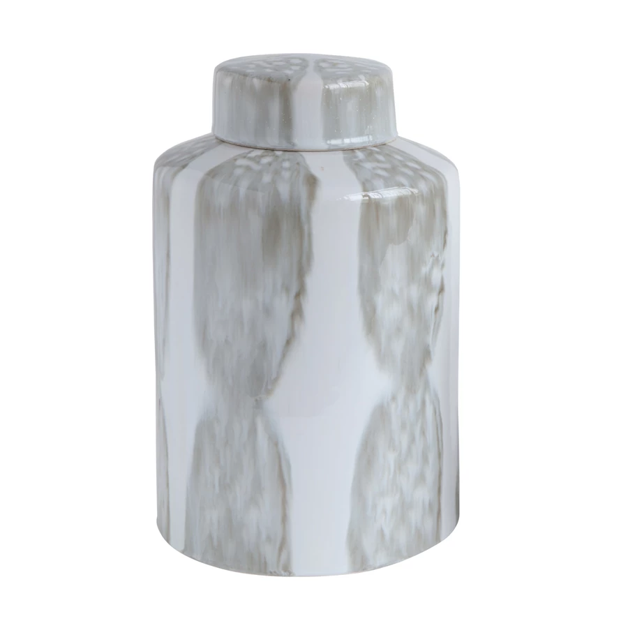 Round stoneware ginger jar in natural earth tones with a textured ceramic finish.