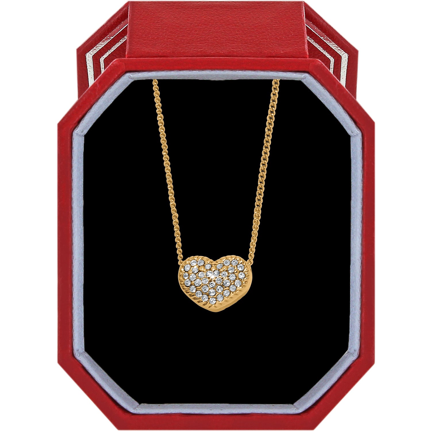 Gold-plated Illumina Celeste Heart Petite Necklace with crystals in a red octagonal gift box.