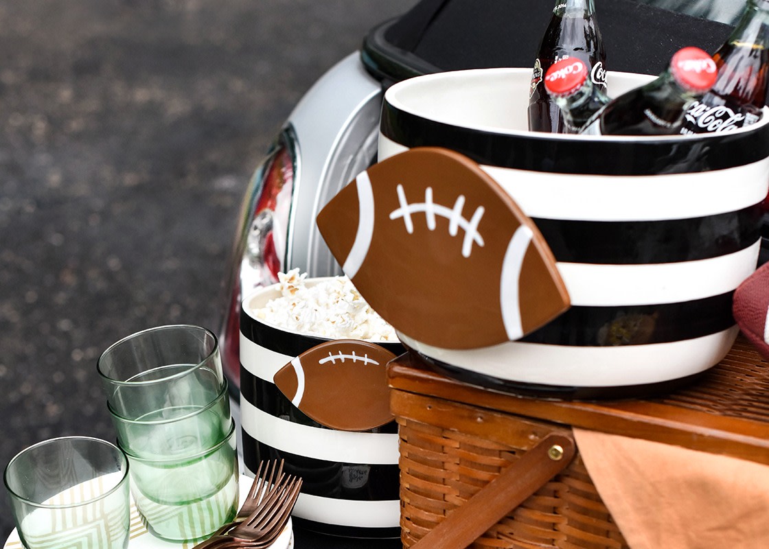 Ceramic football-shaped attachment with hook-and-loop fastener.