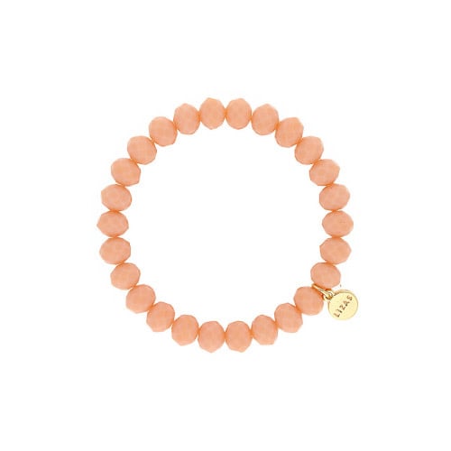 Stretchy beaded bracelet with faceted glass beads in apricot color.