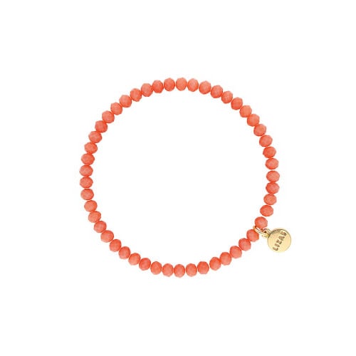 Stretchy beaded bracelet with faceted glass beads in blush color.
