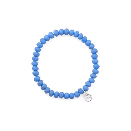Stretchy blue faceted glass bead bracelet with a beaded pattern.