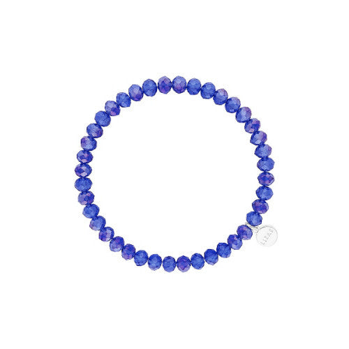 Stretchy beaded bracelet with faceted glass beads in clear night sky colors.