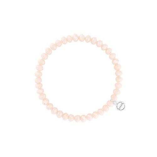 Stretchy beaded bracelet with faceted light beige glass beads.