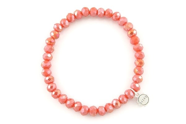 Stretchy bracelet with faceted orange crystal glass beads