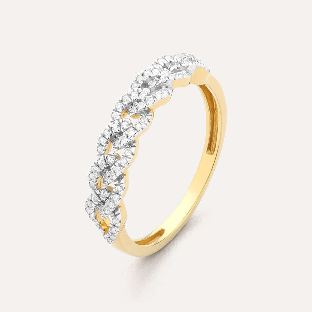 Stackable ring with braided texture in gold-tone metal featuring a small flower accent.