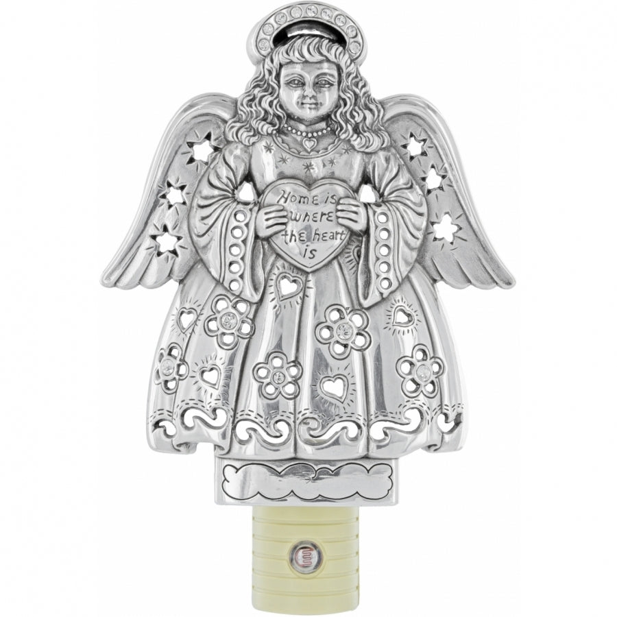 Silver plated Angel Heart night light with a glowing bulb inside.