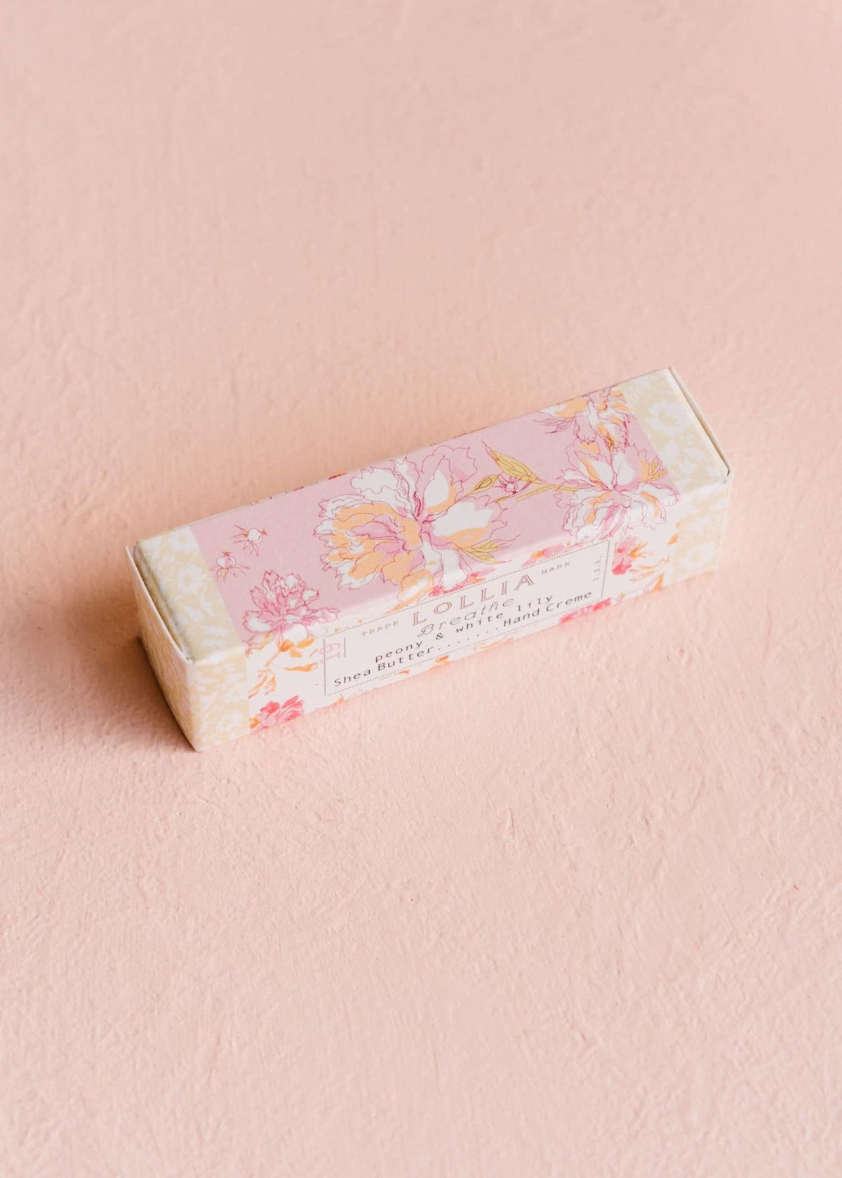 Breathe Petite Treat hand cream in vintage cabbage rose and peony pattern packaging with Peony & White Lily scent.