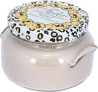 11oz Tyler Candle in a glass jar with a leopard print lid featuring gold scrollwork accents.