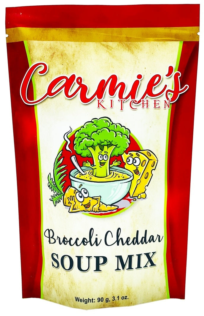 Bag of Carmie's Broccoli Cheddar Soup Mix with visible broccoli pieces.