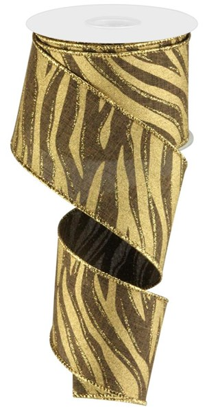 2.5-inch wide brown and gold glittery leopard print ribbon on a spool.