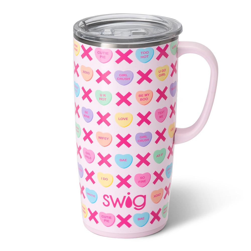 Silver stainless steel travel mug with a slim metal handle, silicone base, and large lid featuring a removable slider.