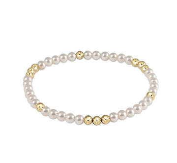 Worthy Pattern 3mm bead bracelet featuring white pearls and 14kt gold-filled beads on elastic.