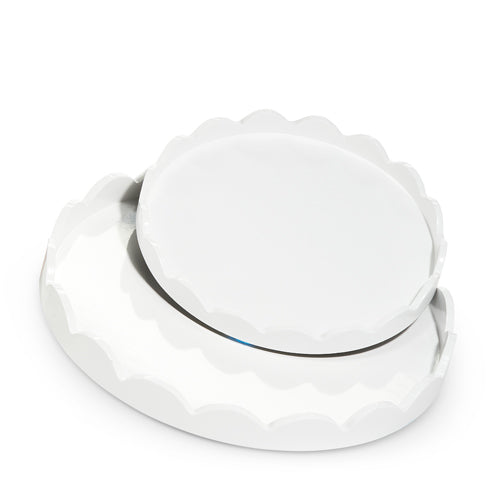 Two round white MDF trays with scalloped edges, shown stacked in different sizes.