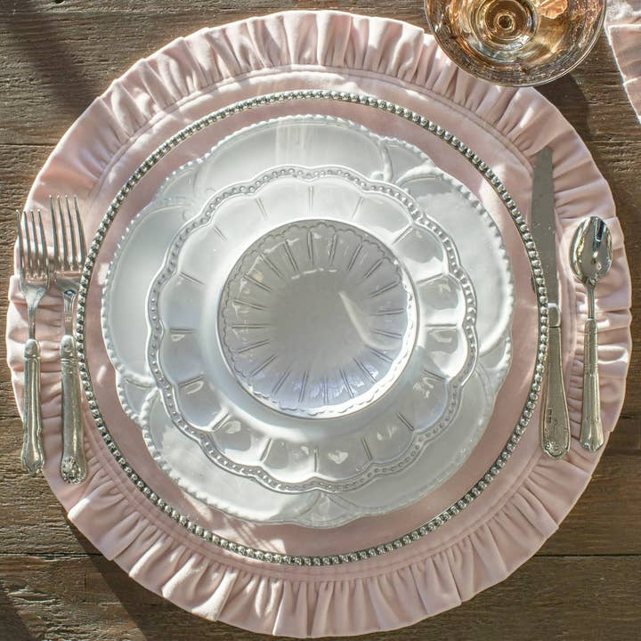 Round ruffle velvet placemat in a soft neutral tone with an 18-inch diameter.