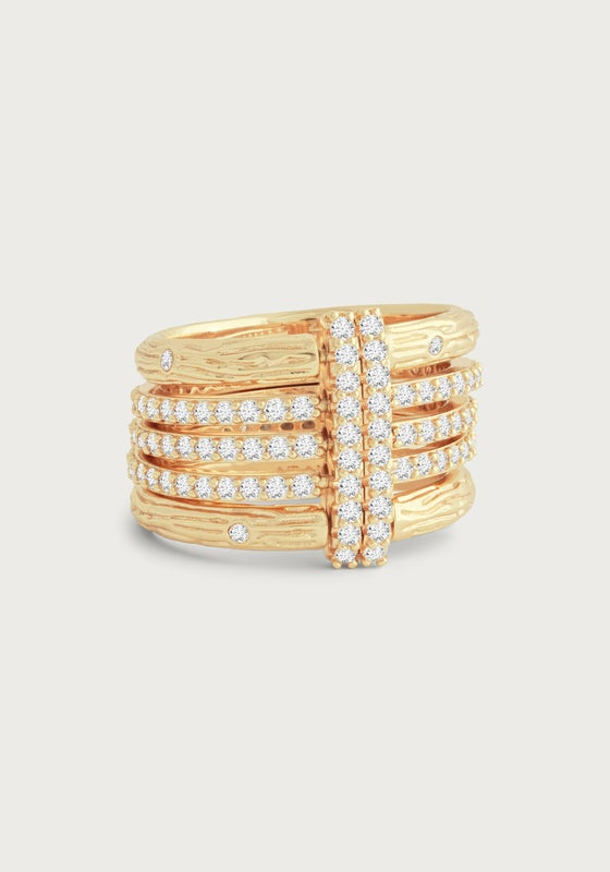 Gold-plated multi-stack ring with woodgrain texture and hand-set pavé crystal bands.