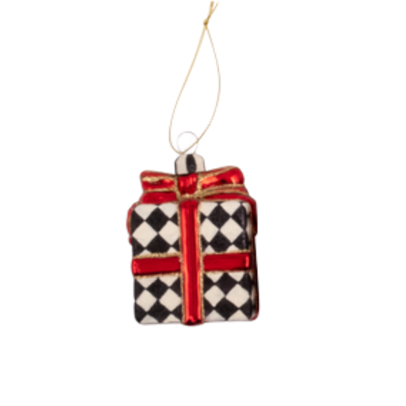 Glass gift box ornament with black and white diamond pattern, red ribbon, and gold hanging string.