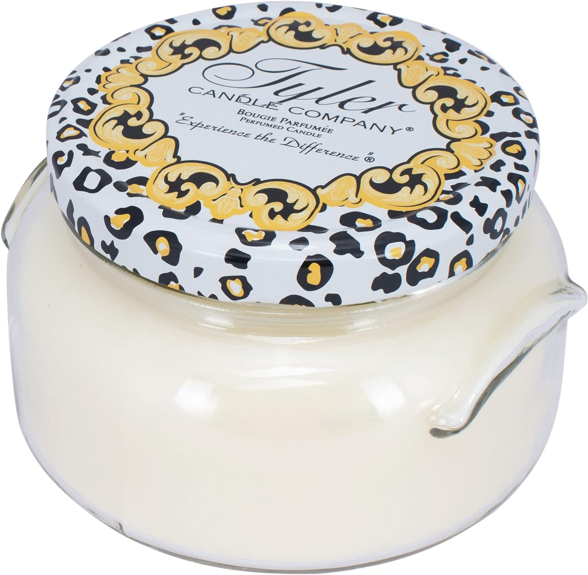 A black glass jar containing a candle with the label Tyler Candle.