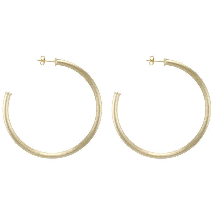 Silver plated hoop earrings with a soldered seal.