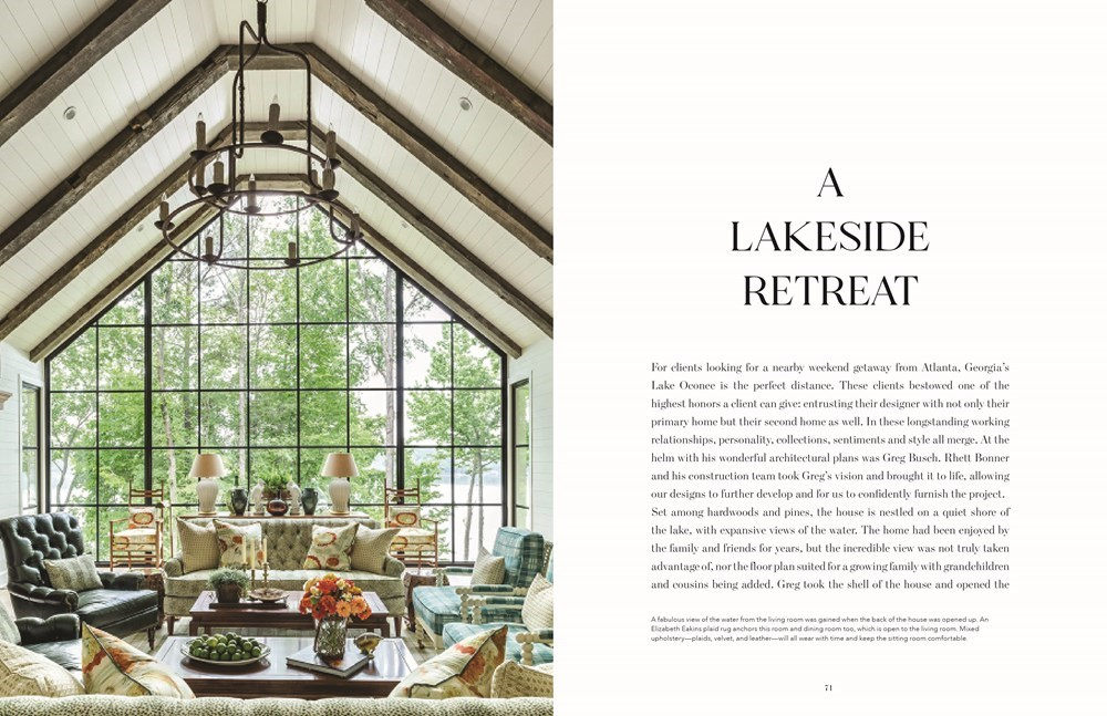 Open book spread showing a rustic living room with a large window and vaulted beamed ceiling.