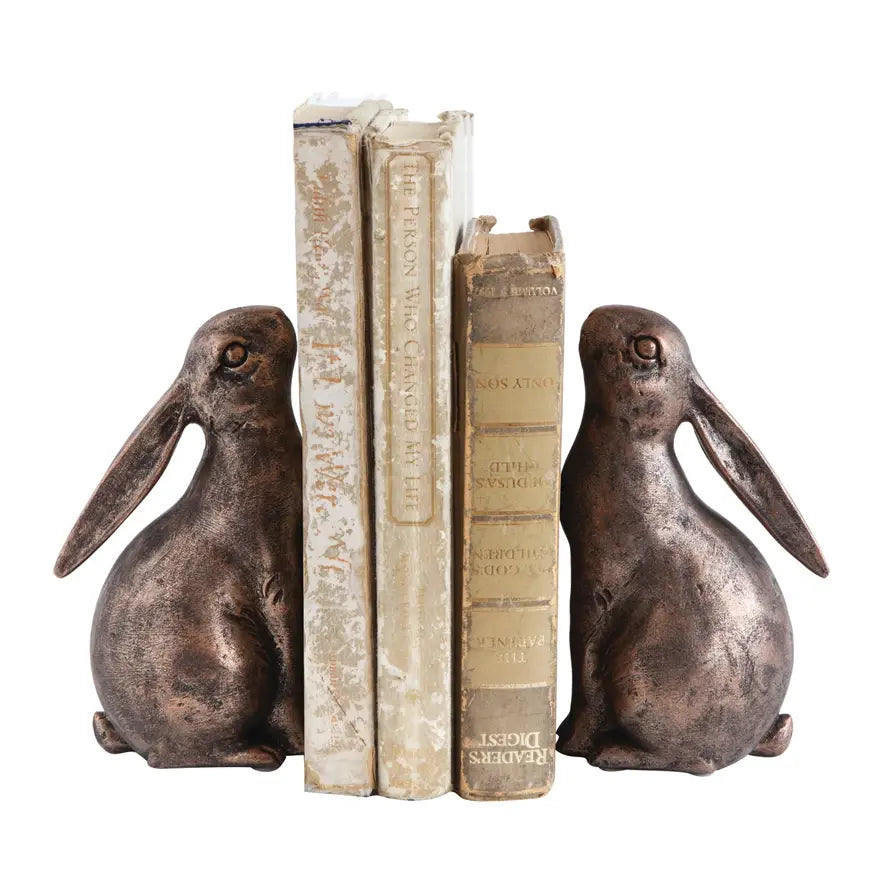 Set of two white bunny-shaped bookends with rounded ears.