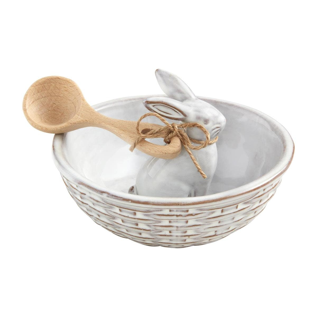 White stoneware candy bowl with basket weave texture, center bunny figurine, and wooden scoop.
