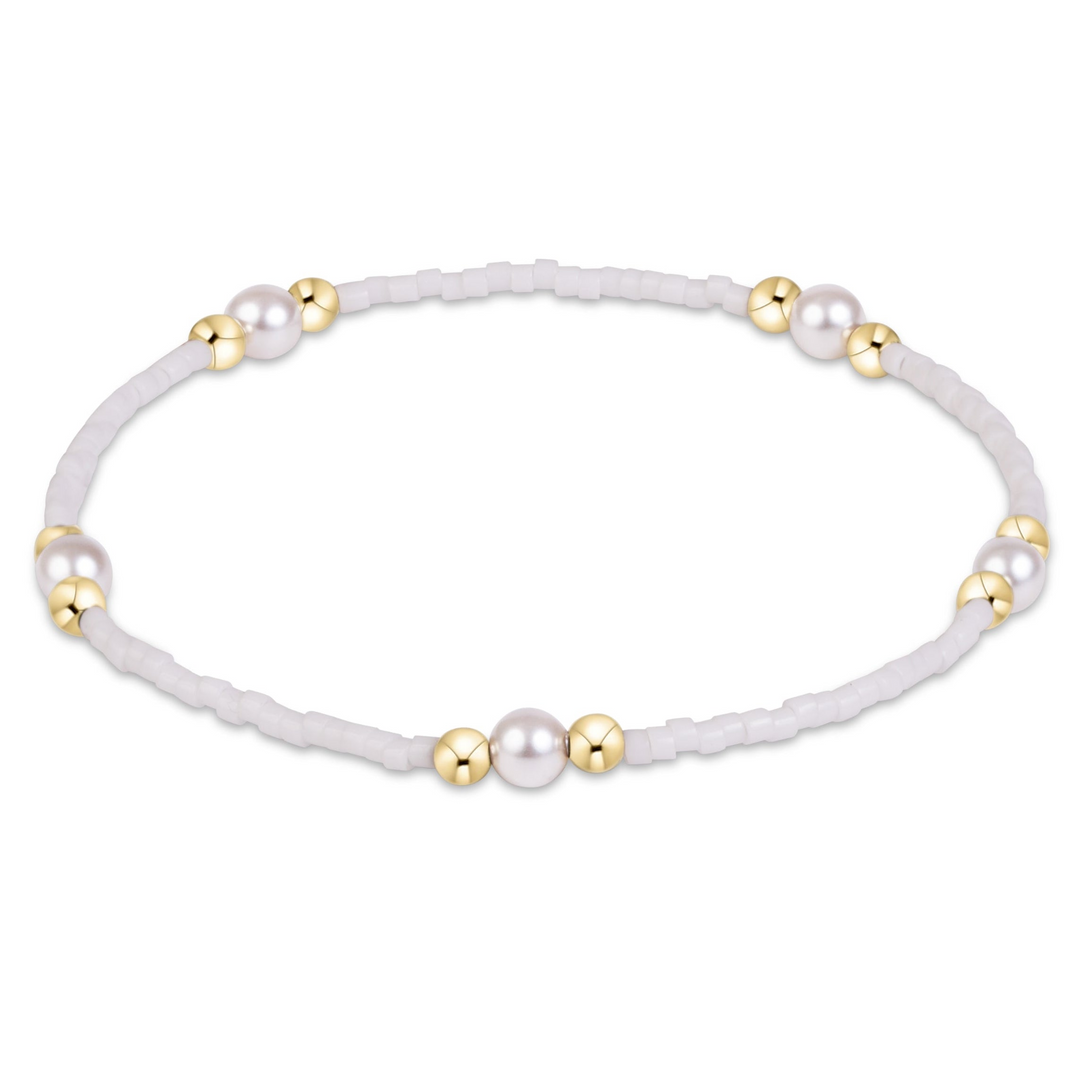 Gameday Hope Purpose Pearl Bracelet with white seed beads, gold-filled beads, and pearls.