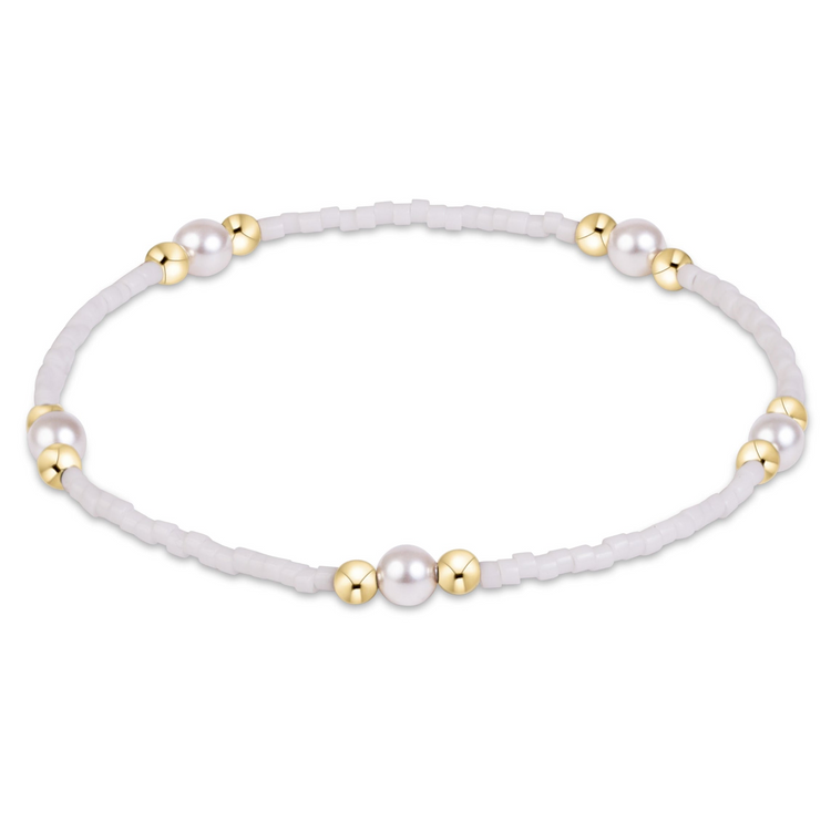 Gameday Hope Purpose Pearl Bracelet with white seed beads, gold-filled beads, and pearls.