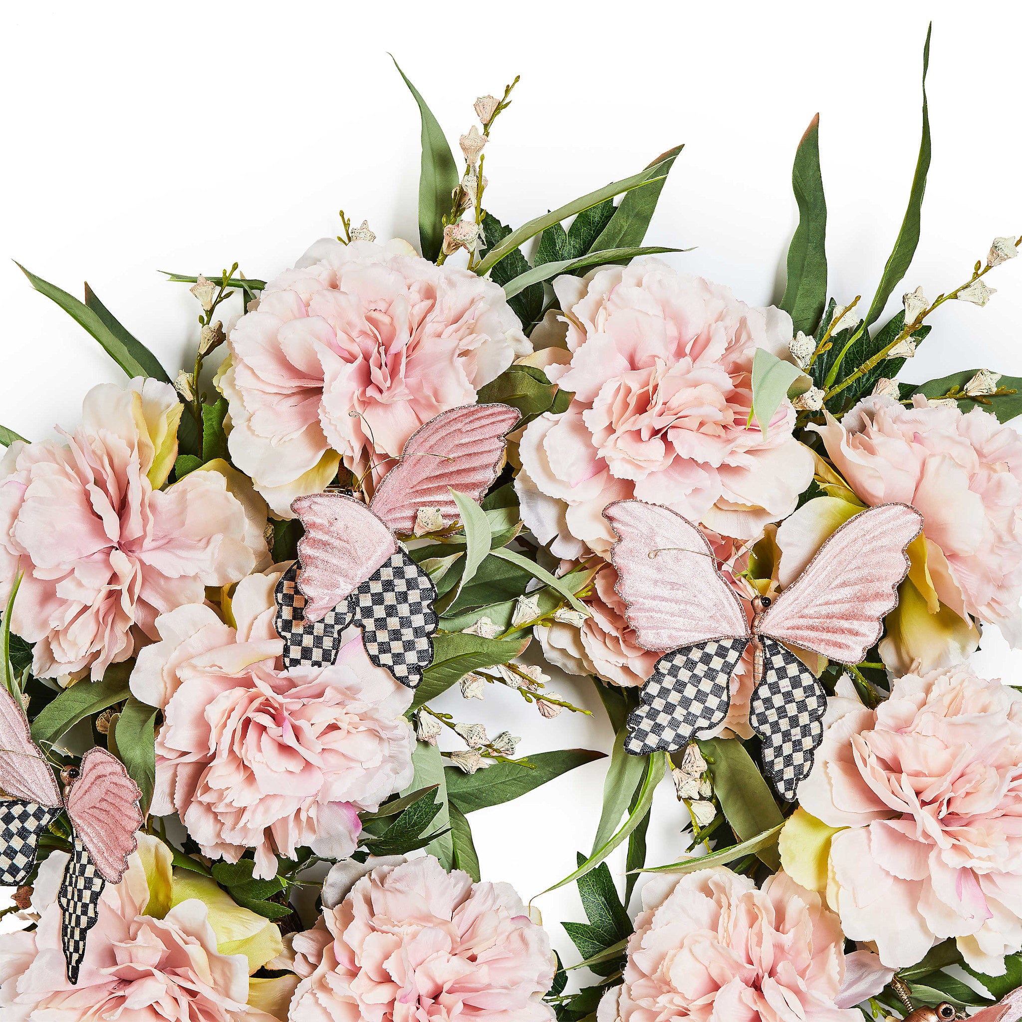 Pink peony wreath with butterfly accents on a natural base