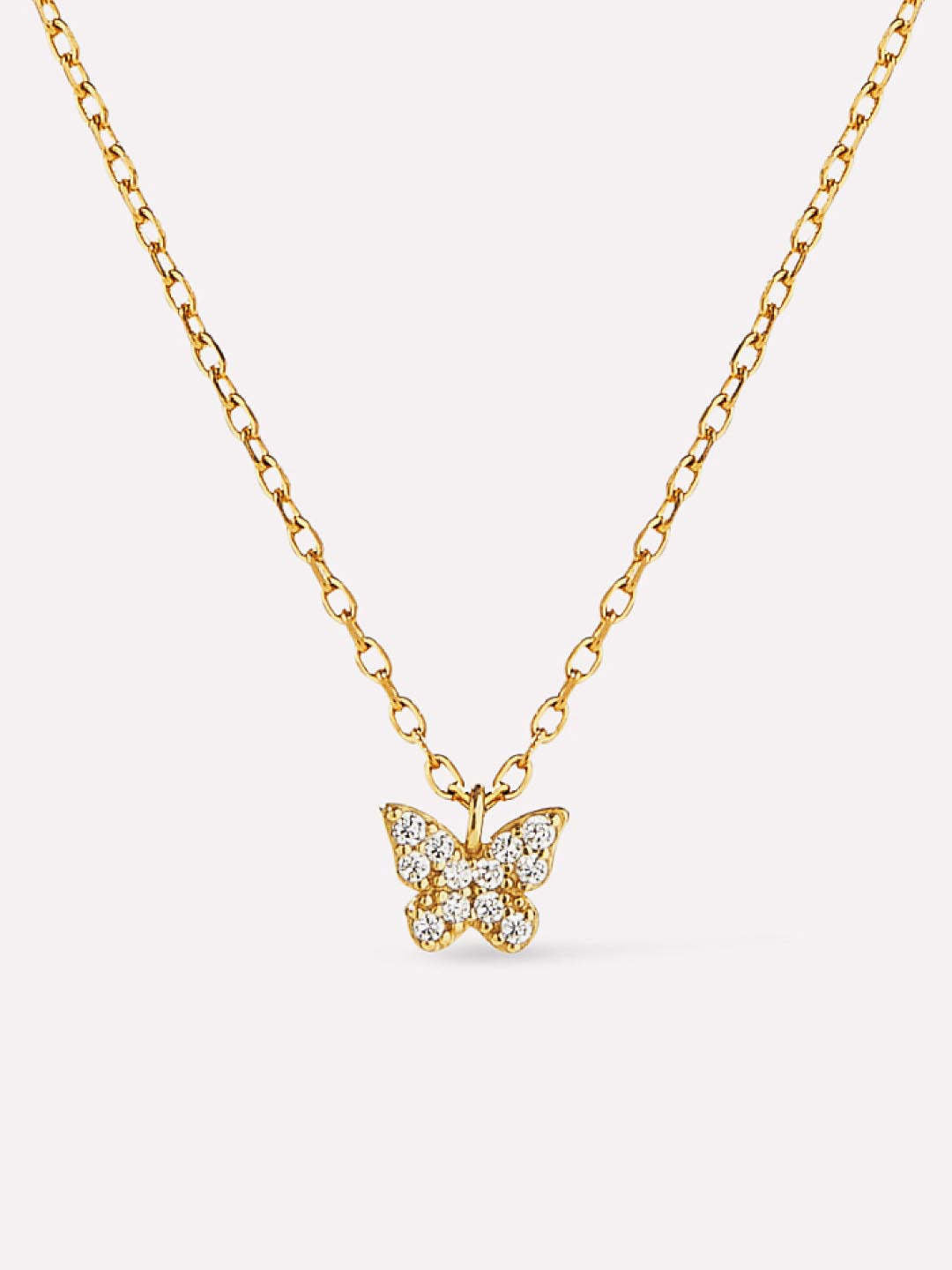 Dainty recycled sterling silver butterfly necklace with cubic zirconia accents on a gold-dipped chain.
