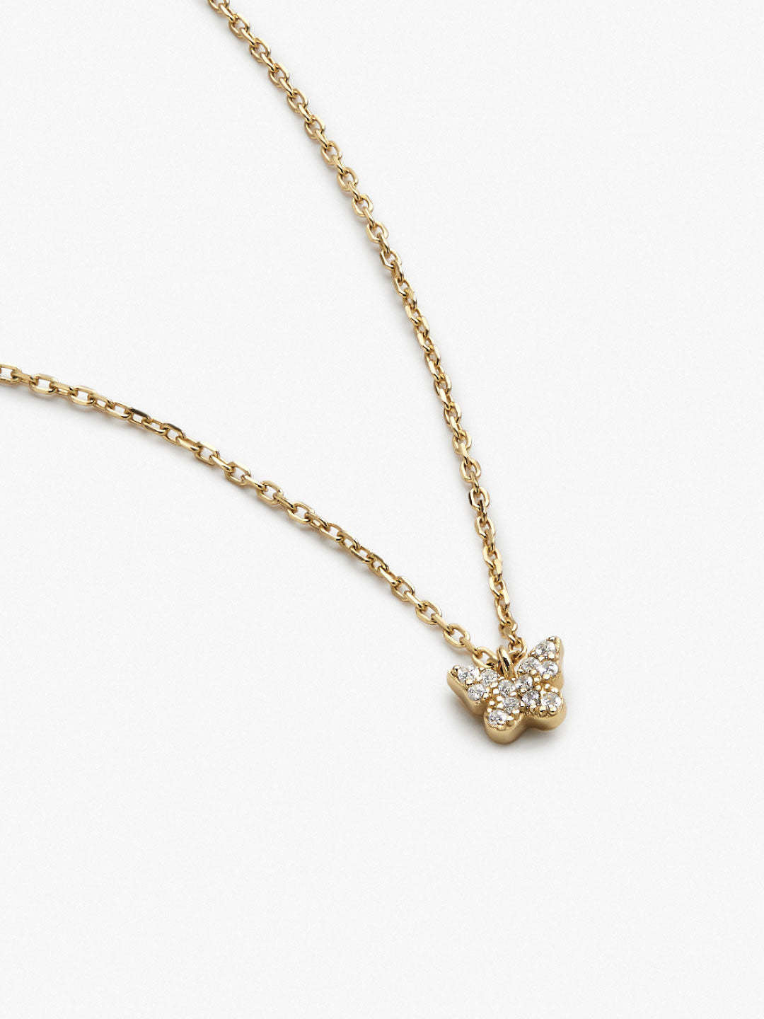 Dainty recycled sterling silver butterfly necklace with cubic zirconia accents in gold dip finish.