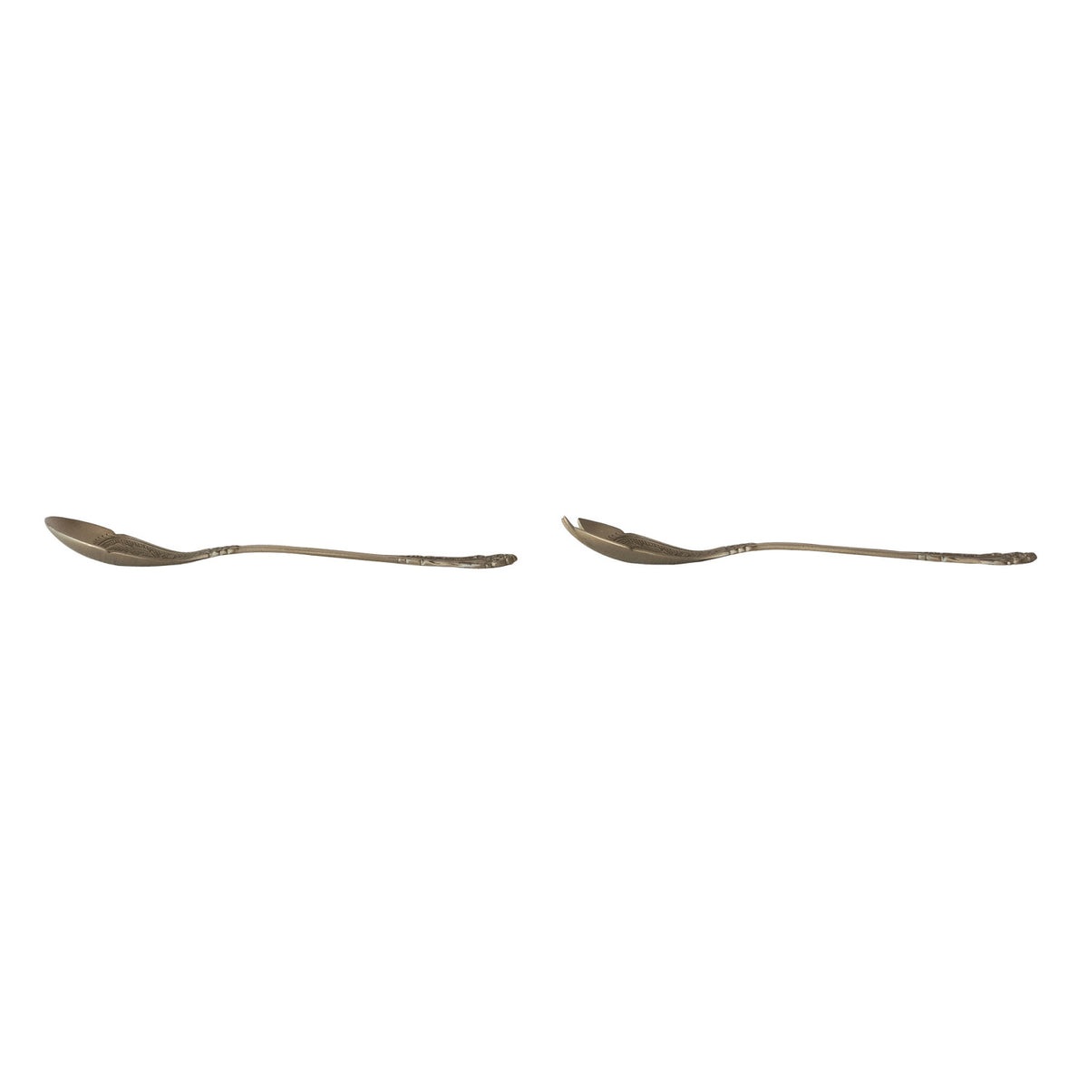 Side view of two embossed brass salad servers, a spoon and a spork, with ornate handles.