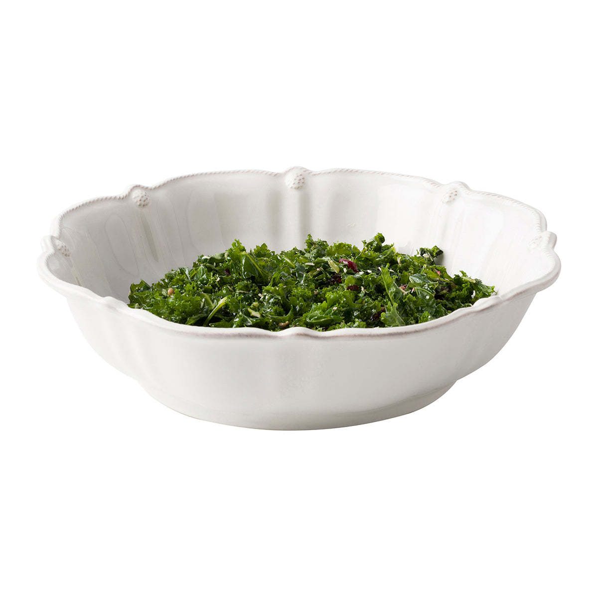 Berry & Thread 13-inch whitewash ceramic serving bowl filled with kale salad.