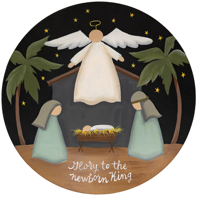 Glory to the Newborn King nativity plate featuring a gold-colored silhouette with red and blue accents on white ceramic.