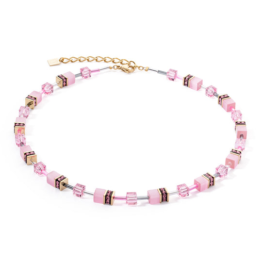 Geo Cube Mono Gold Necklace featuring pink cube beads and gold-toned accents on a white background.