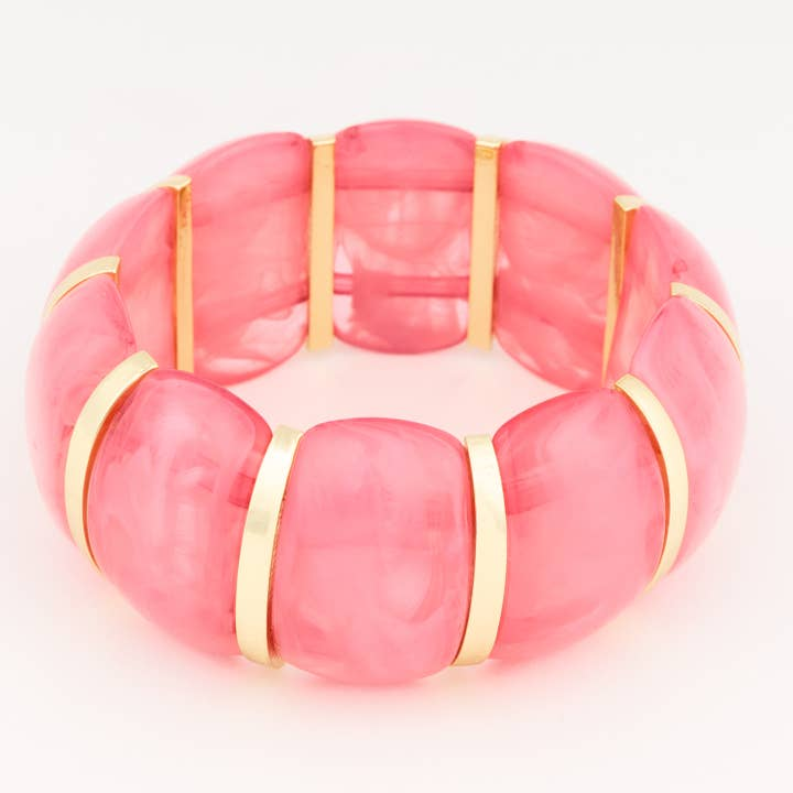 Talia Pink Bracelet featuring chunky pink marbled resin beads separated by gold-tone metal bars.