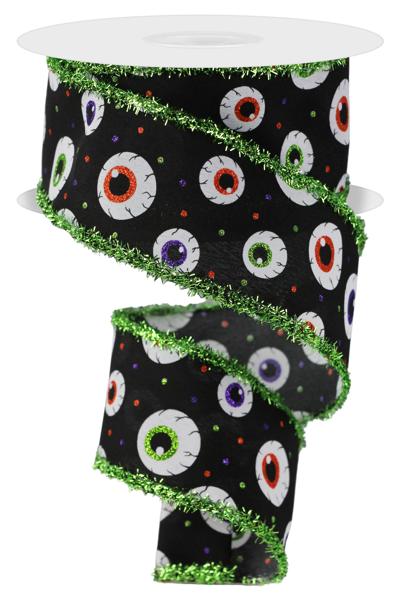 White polyester eyeball tinsel ribbon with black accents